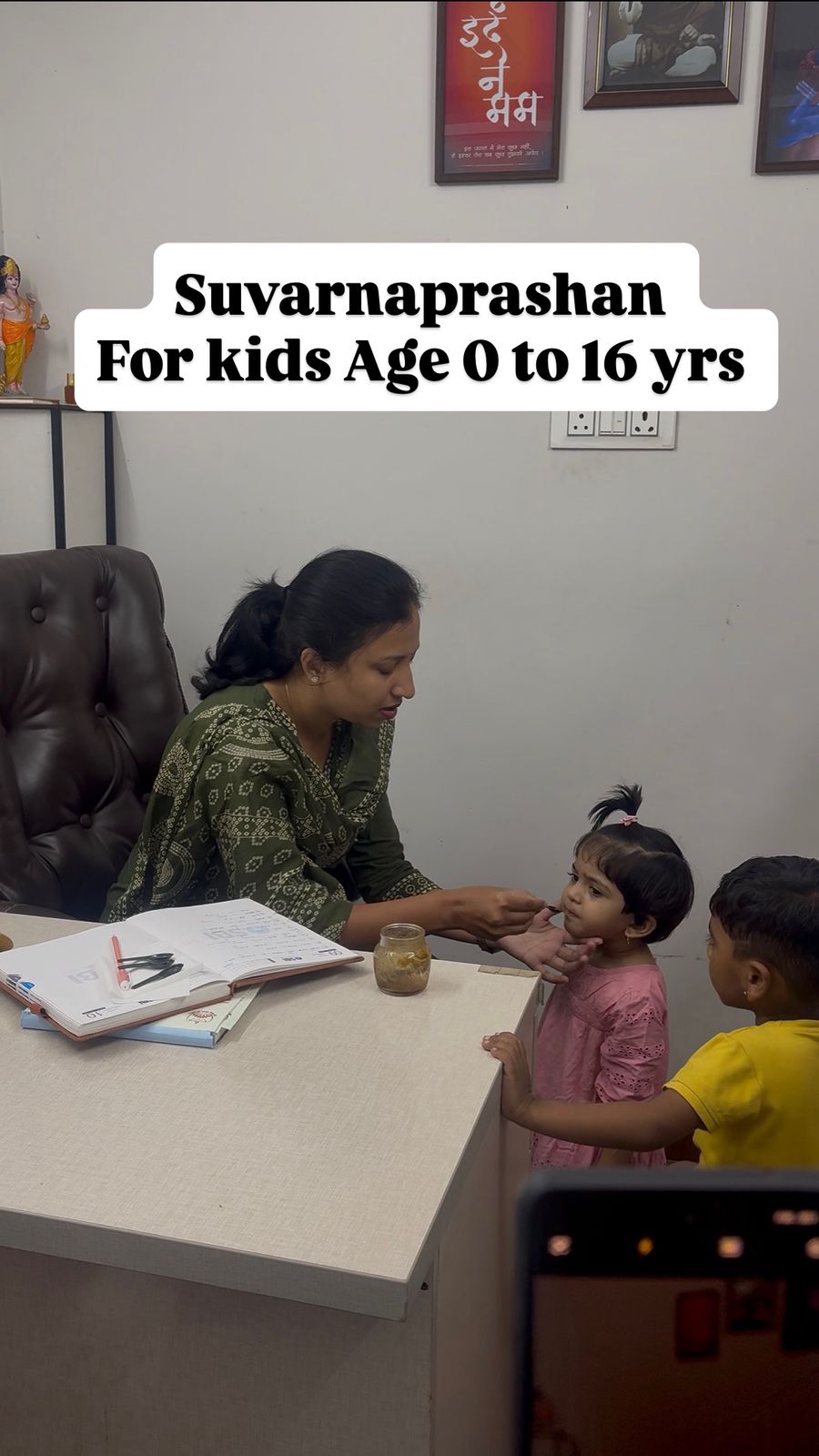 Dr. Pallavi Nimkar consulting with a baby patient at Saumya Ayurved Clinic